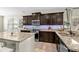 Spacious kitchen with granite countertops, dark cabinets, and modern stainless appliances at 3110 Bramble Glen Dr., Myrtle Beach, SC 29579