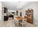 Bright, eat-in kitchen featuring updated appliances, granite countertops, and breakfast nook at 3110 Bramble Glen Dr., Myrtle Beach, SC 29579