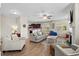 Spacious living room with hardwood floors, a fireplace, and modern decor, perfect for Gathering gatherings at 3110 Bramble Glen Dr., Myrtle Beach, SC 29579
