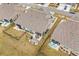 Aerial view of a home featuring a patio, landscaped yard, and fenced backyard at 328 Logan St., Little River, SC 29566