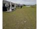 Expansive backyard with lake view, perfect for outdoor activities and relaxation at 328 Logan St., Little River, SC 29566