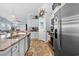 Bright, updated kitchen with stainless steel appliances and granite countertops at 328 Logan St., Little River, SC 29566
