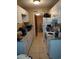 Bright kitchen featuring white cabinets and appliances, and tiled floor at 4011 Southern Cross Rd., Myrtle Beach, SC 29579