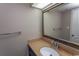 Well-lit bathroom with a large framed mirror, single sink vanity, and stylish decor at 6804 Ocean Blvd. N # 625, Myrtle Beach, SC 29572