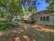 Spacious backyard featuring lush greenery and mature trees for enhanced privacy at 710 Masters Dr., Pawleys Island, SC 29585