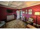 This charming bedroom features detailed millwork, hardwood floors and a decorative fireplace at 710 Masters Dr., Pawleys Island, SC 29585