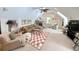 Spacious living room featuring a fireplace, vaulted ceilings, and cozy seating at 710 Masters Dr., Pawleys Island, SC 29585