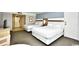 Bright bedroom featuring two beds with white linens and a wall mounted television at 7100 N Ocean Blvd. # 405, Myrtle Beach, SC 29572