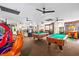 Spacious game room featuring several arcade machines, pool tables, and comfortable seating at 7100 N Ocean Blvd. # 405, Myrtle Beach, SC 29572