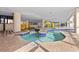 Indoor waterpark with slides, water features, and shallow pool area for children at 7100 N Ocean Blvd. # 405, Myrtle Beach, SC 29572