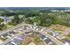Wide aerial view of a suburban neighborhood, highlighting the community and surrounding green space at 742 Woodside Dr., Conway, SC 29526