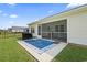 Screened in patio with seating and large backyard at 742 Woodside Dr., Conway, SC 29526