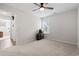 Neutral bedroom with carpet flooring, a ceiling fan, and natural light at 742 Woodside Dr., Conway, SC 29526