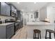 Updated kitchen with stainless steel appliances, granite countertops and adjacent breakfast bar at 742 Woodside Dr., Conway, SC 29526