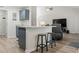 Open kitchen with a breakfast bar and barstools open to the living area at 742 Woodside Dr., Conway, SC 29526