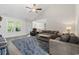 Spacious living area with vaulted ceilings, comfortable seating, and a view to the backyard at 742 Woodside Dr., Conway, SC 29526