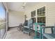 Screened in patio with seating, ceiling fan, and views of backyard at 742 Woodside Dr., Conway, SC 29526