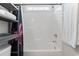 Clean shower featuring white enclosure, shelving and accenting towels at 742 Woodside Dr., Conway, SC 29526