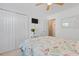 Cozy bedroom with flamingo bedding, closet, and television set for relaxing at 10 Logan Berry Ct. # H, Murrells Inlet, SC 29576