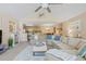 Relaxing living space with an open concept to the kitchen and dining, featuring cozy decor and natural light at 10 Logan Berry Ct. # H, Murrells Inlet, SC 29576