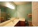 Spacious bathroom with a long vanity and a shower behind glass and neutral tiling at 110 Portsmith Dr. # 8, Myrtle Beach, SC 29588