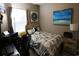 Modern bedroom with neutral tones, a comfortable bed, and workspace, ideal for relaxation and productivity at 110 Portsmith Dr. # 8, Myrtle Beach, SC 29588