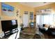 Bright living room with nautical decor and comfortable seating, creating a relaxing beach-themed atmosphere at 110 Portsmith Dr. # 8, Myrtle Beach, SC 29588