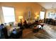 Open-concept living room featuring beachy decor, comfortable seating, and an adjacent dining area at 110 Portsmith Dr. # 8, Myrtle Beach, SC 29588
