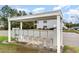 Community mailboxes with a sheltered structure, landscaping, and nearby parking for convenient mail access at 110 Portsmith Dr. # 8, Myrtle Beach, SC 29588