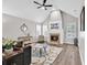 Bright living room boasts a fireplace, vaulted ceiling, and neutral decor at 130 Ashton Circle, Myrtle Beach, SC 29588