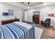 Main bedroom featuring a blue color scheme, fan, and wood-look flooring at 130 Ashton Circle, Myrtle Beach, SC 29588