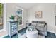Comfortable sunroom filled with natural light and tranquil views of the backyard at 130 Ashton Circle, Myrtle Beach, SC 29588
