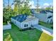Beautiful property with manicured landscaping, a spacious lawn, and a two-car garage, ideal for modern living at 147 Marsh Deer Place, Surfside Beach, SC 29575