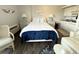 Cozy bedroom features a comfortable bed, stylish decor, and a kitchenette for a convenient stay at 2001 S Ocean Blvd. S # 511, Myrtle Beach, SC 29577
