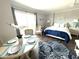 Inviting living area with ocean views, a dining space, and a queen bed for comfortable living at 2001 S Ocean Blvd. S # 511, Myrtle Beach, SC 29577