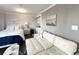Inviting living space features a well-equipped kitchenette, comfortable seating, and a queen-size bed at 2001 S Ocean Blvd. S # 511, Myrtle Beach, SC 29577