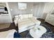 Comfortable seating area features a pull-out sofa, a coffee table, and beach-themed decorations at 2001 S Ocean Blvd. S # 511, Myrtle Beach, SC 29577