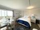 Cozy condo with sleeping area, dining set, and balcony access, offering a relaxing retreat at 2001 S Ocean Blvd. S # 511, Myrtle Beach, SC 29577