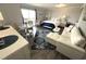 Inviting living space features comfortable seating, a dining table, a queen-size bed, and beach-themed decor at 2001 S Ocean Blvd. S # 511, Myrtle Beach, SC 29577