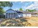 Backyard view of the home featuring a screened in patio at 202 Berkshire Dr., Myrtle Beach, SC 29588