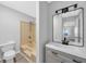 Bathroom features a shower/tub combo, toilet, and vanity sink with mirror at 202 Berkshire Dr., Myrtle Beach, SC 29588