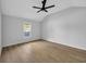 Bright bedroom offers natural light, neutral paint, and ceiling fan at 202 Berkshire Dr., Myrtle Beach, SC 29588