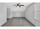 Bright bedroom with gray carpet, ceiling fan and natural light from a window at 202 Berkshire Dr., Myrtle Beach, SC 29588