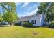 Charming home with well-maintained front yard and mature trees at 202 Berkshire Dr., Myrtle Beach, SC 29588