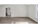 Bright living room with freshly installed hardwood flooring, offering a blank canvas to design your ideal living space at 202 Berkshire Dr., Myrtle Beach, SC 29588