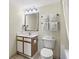 Clean bathroom with a single sink vanity, toilet, and well-lit mirror, offering essential amenities at 2711 S Ocean Blvd. # 621, North Myrtle Beach, SC 29582