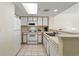 Bright kitchen featuring white appliances and plenty of counter space at 2711 S Ocean Blvd. # 621, North Myrtle Beach, SC 29582