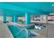 Indoor lazy river featuring a blue ceiling, tiled accents, columns, and plenty of space for floating and relaxing at 2711 S Ocean Blvd. # 621, North Myrtle Beach, SC 29582