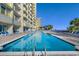 Outdoor pool with lounge chairs and umbrellas, set in a pool area with ocean views and a beachfront resort at 2711 S Ocean Blvd. # 621, North Myrtle Beach, SC 29582