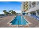 Outdoor pool with lounge chairs and umbrellas, set in a pool area with ocean views and a beachfront resort at 2711 S Ocean Blvd. # 621, North Myrtle Beach, SC 29582
